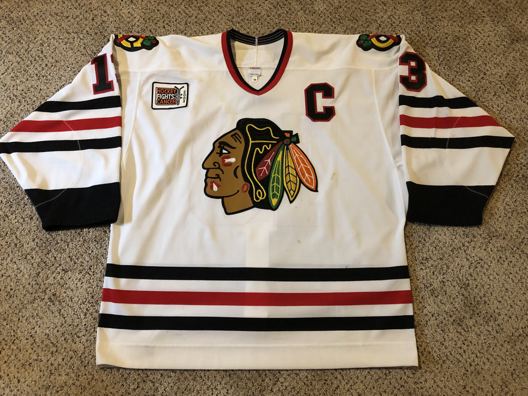 31-Autographed Authentic Hockey Fights Cancer Warmup Jersey - Chicago  Blackhawks - NHL Auctions